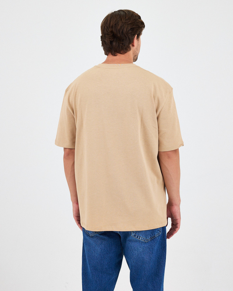 Unisex T-shirt with embroidered logo patch | “I AM A PATCH” Collection