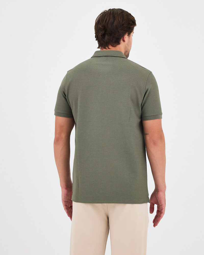 Unisex polo shirt with embroidered logo patch | "I AM A PATCH" collection