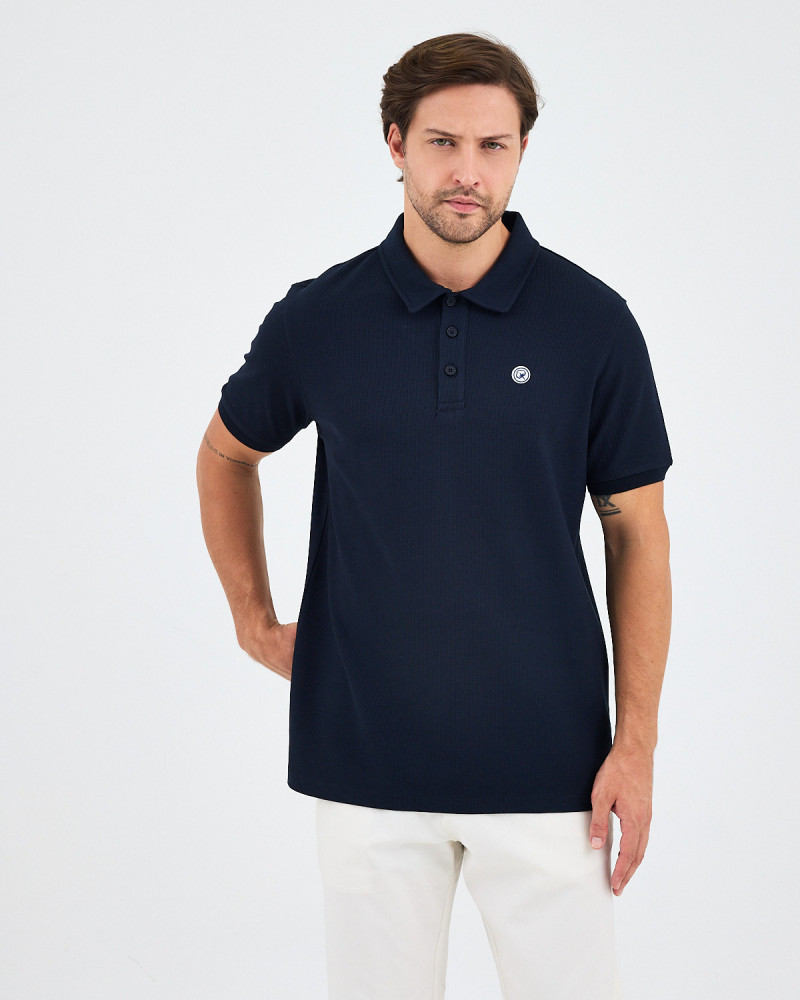 Unisex polo shirt with embroidered logo patch | "I AM A PATCH" collection