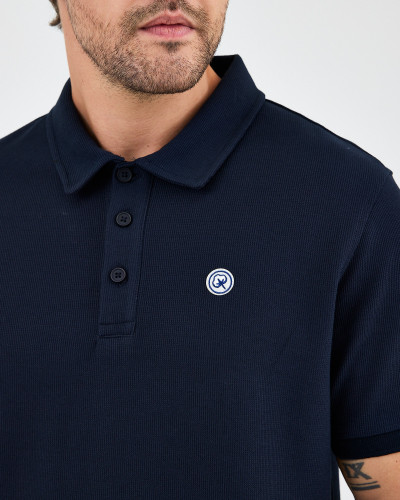 Unisex polo shirt with embroidered logo patch | "I AM A PATCH" collection