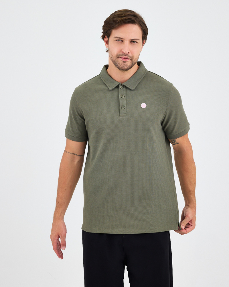 Unisex polo shirt with embroidered logo patch | "I AM A PATCH" collection