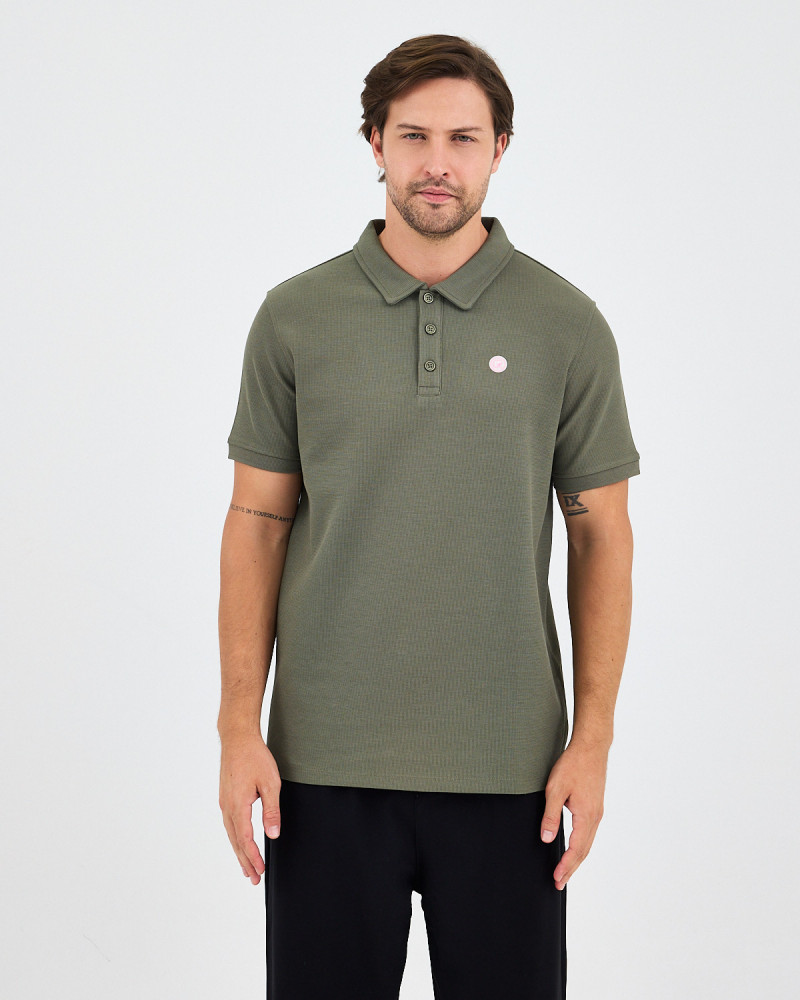 Unisex polo shirt with embroidered logo patch | "I AM A PATCH" collection