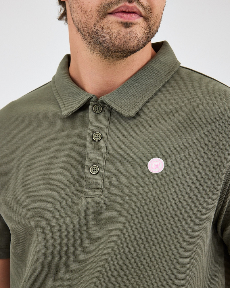 Unisex polo shirt with embroidered logo patch | "I AM A PATCH" collection