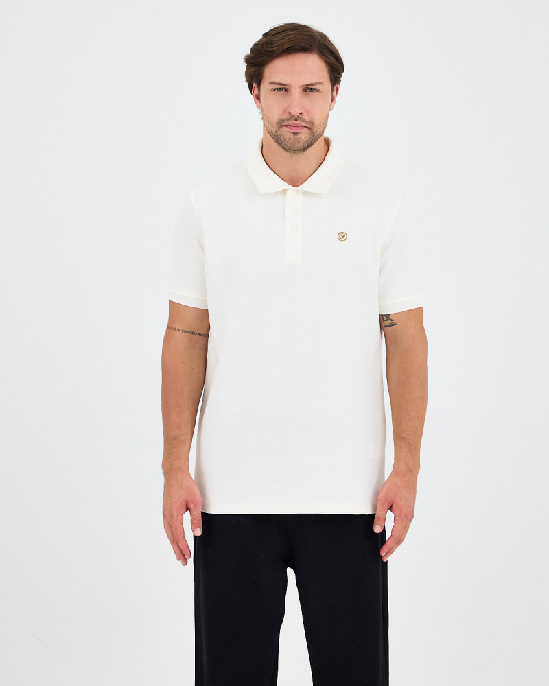 Unisex polo shirt with embroidered logo patch | "I AM A PATCH" collection