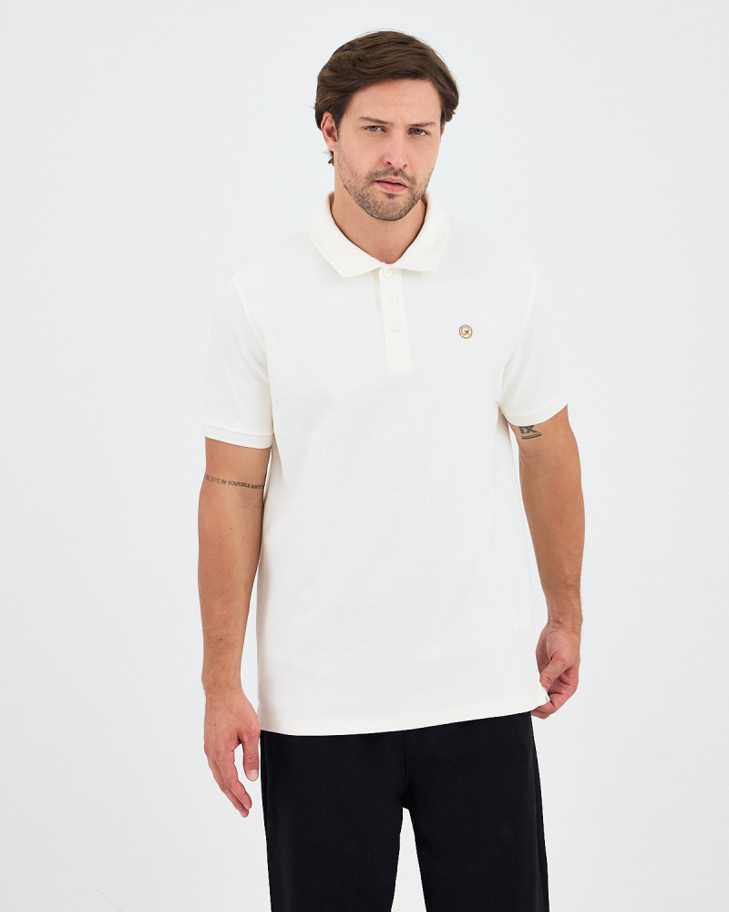 Unisex polo shirt with embroidered logo patch | "I AM A PATCH" collection
