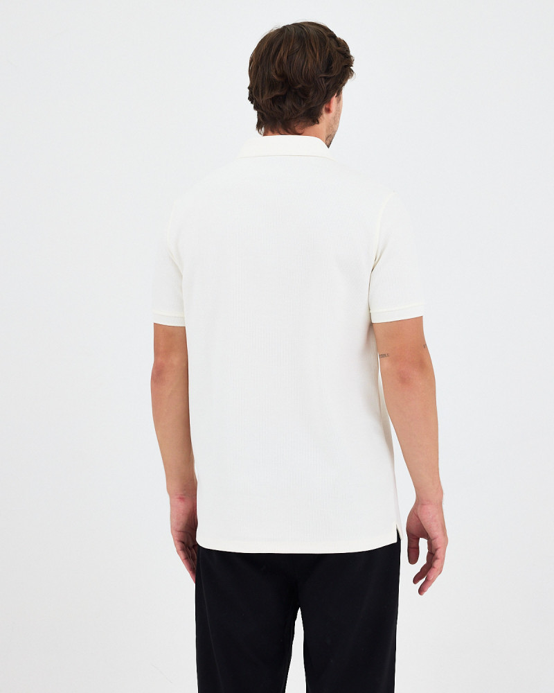Unisex polo shirt with embroidered logo patch | "I AM A PATCH" collection