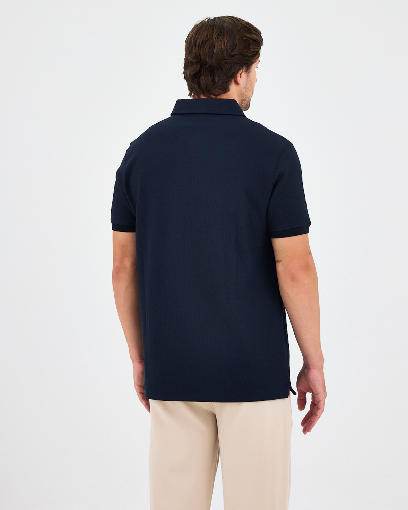 Unisex polo shirt with embroidered logo patch | "I AM A PATCH" collection