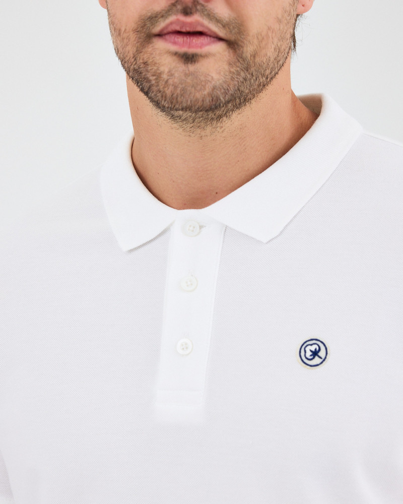 Unisex polo shirt with embroidered logo patch | "I AM A PATCH" collection