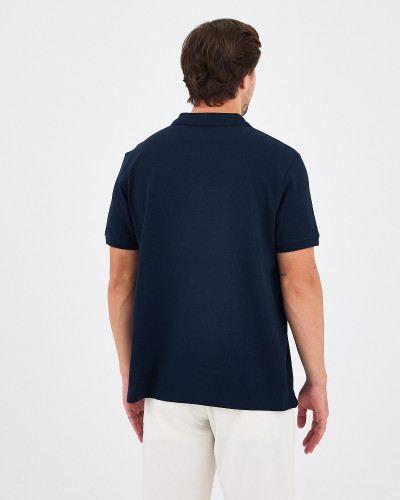 Unisex polo shirt with embroidered logo patch | "I AM A PATCH" collection