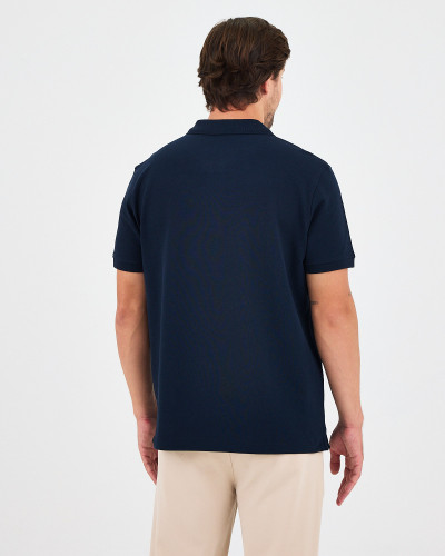 Unisex polo shirt with contrasting embroidered logo | "HERE I AM" collection