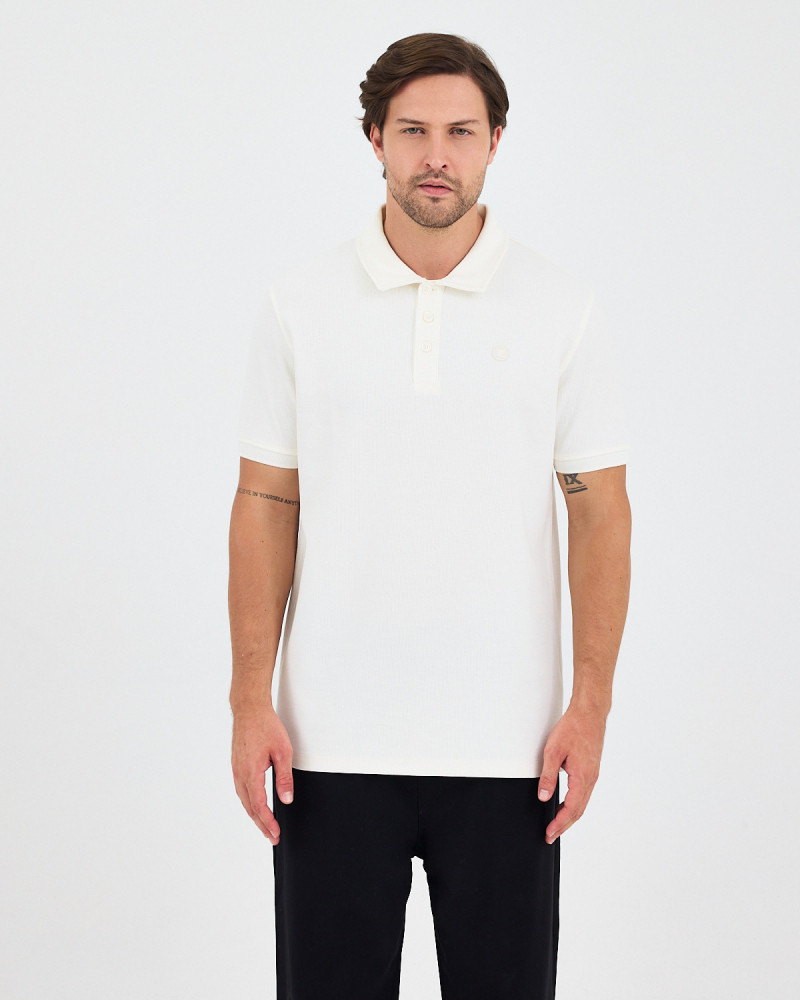 Unisex polo shirt with embroidered logo patch | "I AM A PATCH" collection
