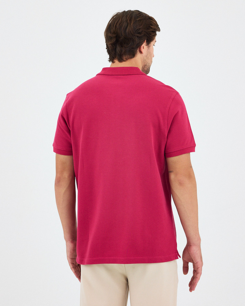 Unisex polo shirt with matching embroidered logo | "I Wasn't Here" Collection