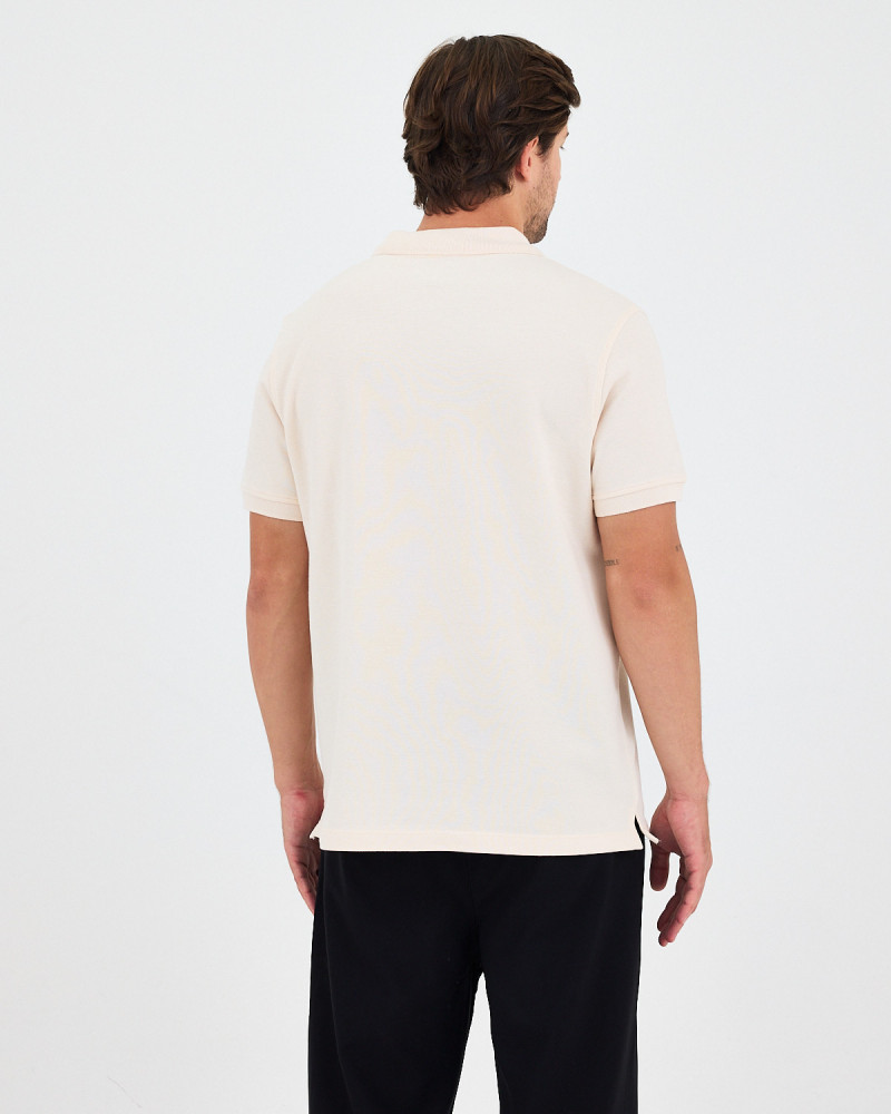 Unisex polo shirt with matching embroidered logo | "I Wasn't Here" Collection