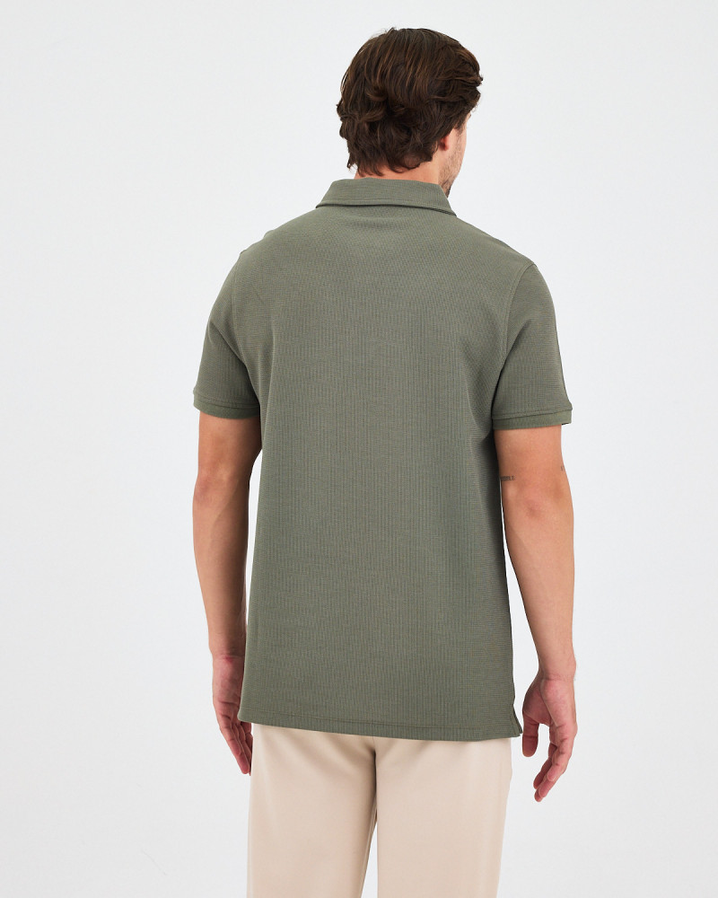 Unisex polo shirt with matching embroidered logo | "I Wasn't Here" Collection