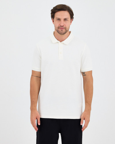Unisex polo shirt with matching embroidered logo | "I Wasn't Here" Collection