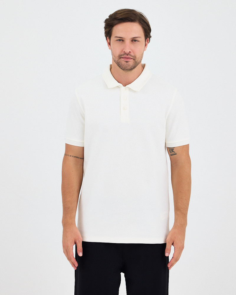 Unisex polo shirt with matching embroidered logo | "I Wasn't Here" Collection