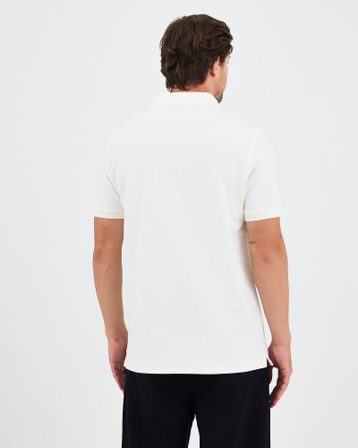 Unisex polo shirt with matching embroidered logo | "I Wasn't Here" Collection