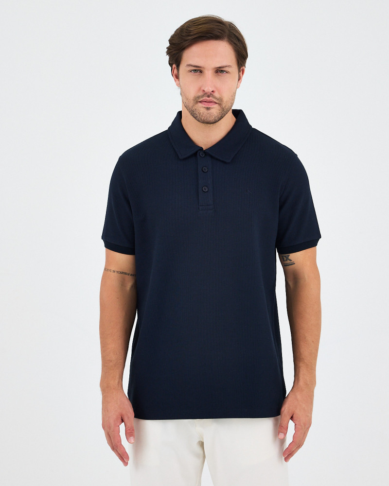 Unisex polo shirt with matching embroidered logo | "I Wasn't Here" Collection