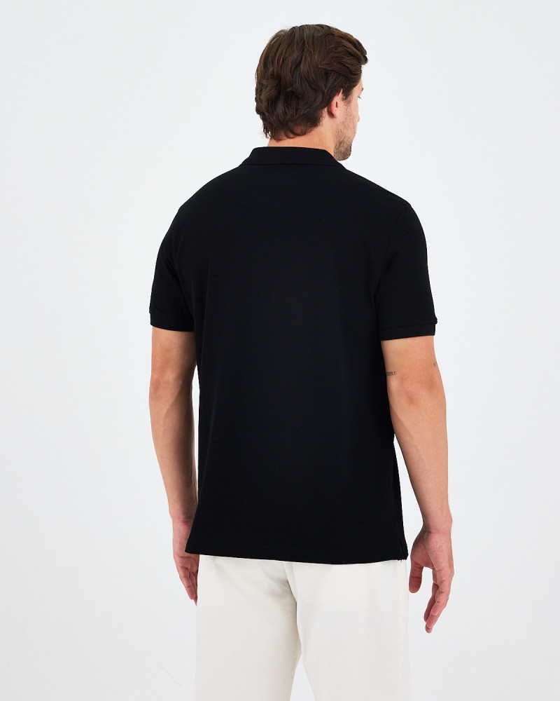 Unisex polo shirt with contrasting embroidered logo | "HERE I AM" collection