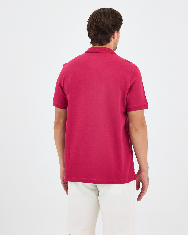 Unisex polo shirt with contrasting embroidered logo | "HERE I AM" collection